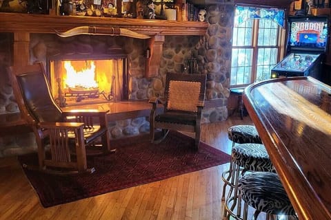 Fireplace and Bar in First-floor Game Room