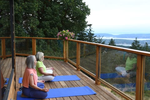 Sitting in silence or meditating on the deck