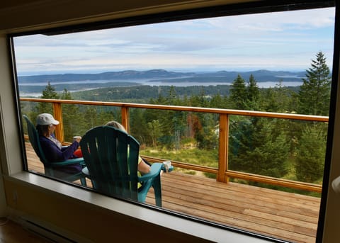 Friends chatting while drinking in the view