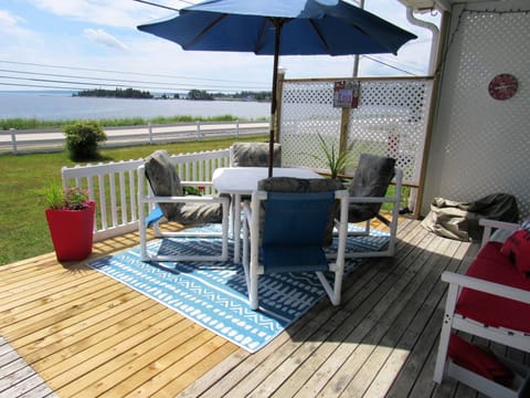 Ocean view from your deck, with a portable propane fire pit for cooler evenings.