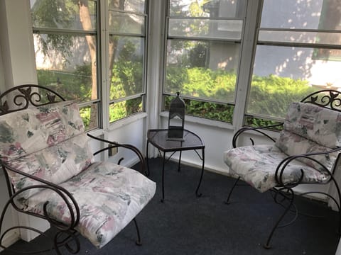 Attached screened porch for your private use.