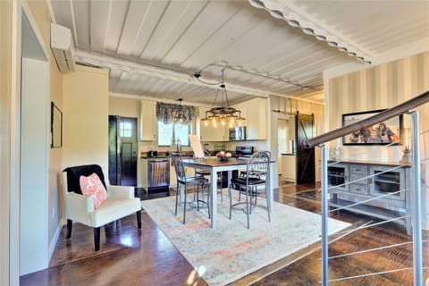 Looking from the spiral staircase into the classy kitchen!
