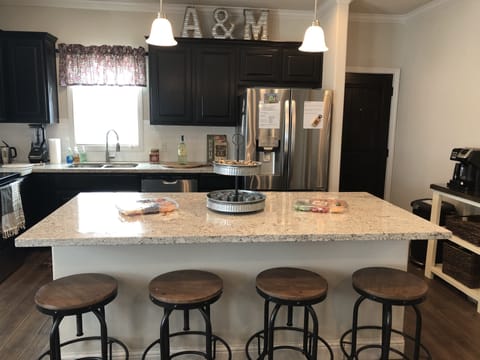 Granite eating bar seats four