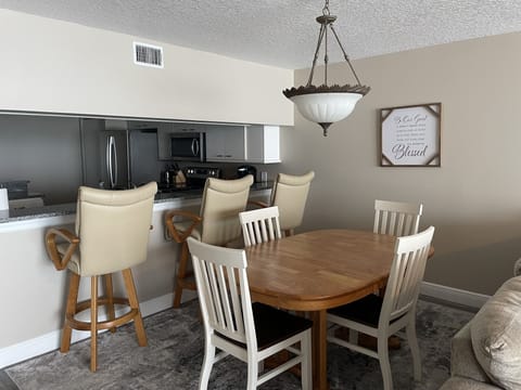 View of the dining area / kitchen table / bar top