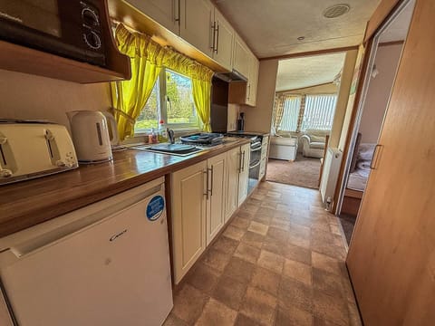 Whether you're planning ahead for holidays 2026 or seeking last minute caravan holidays, Parkdean Resorts Southview Holiday Park Skegness in Skegness in England is the ideal destination for a relaxing staycation UK featuring a cosy kitchen area in a carav