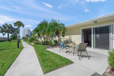 At the end of the sidewalk is access to the private beach.  This lovely back patio awaits you!