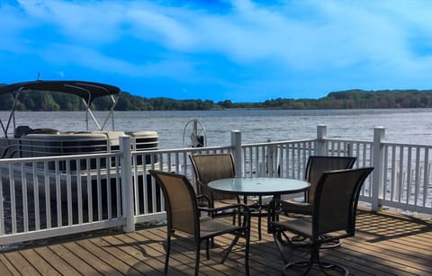 Deck over the lake, hear the waves, take in the views. Relax you are on vacation