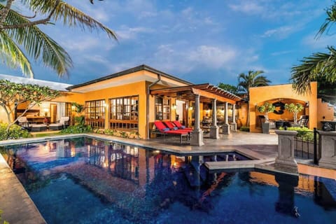 Stunning beachfront villa in Playa Langosta with a private pool, tropical gardens, and direct access to the sand—perfect for an unforgettable Tamarindo beach vacation.