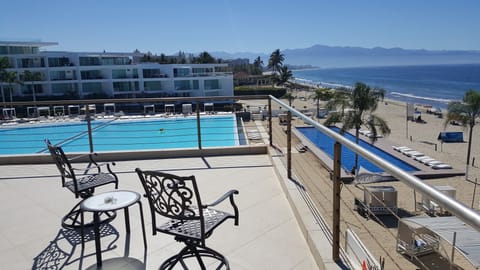 Terrace overlooks beach and Pacific Ocean 