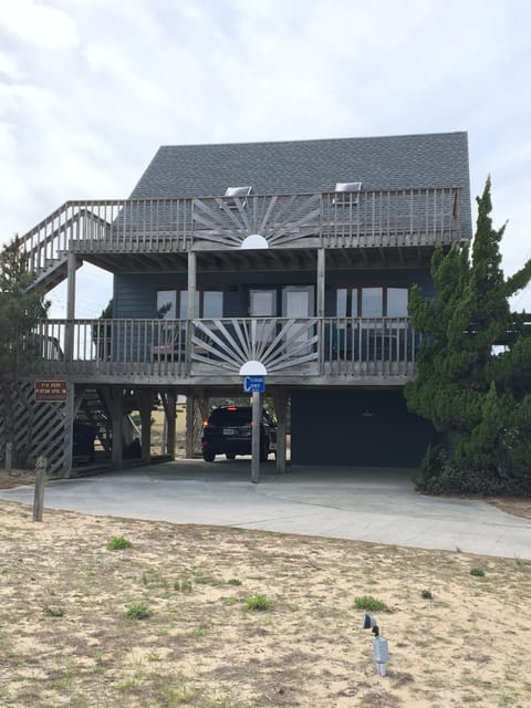 Welcome! Plenty of parking under cottage. Circular driveway and carport. 