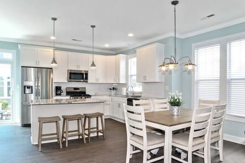 Open concept living, dining & kitchen areas with room for all!!