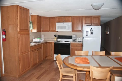 Fully equipped kitchen and dining area.