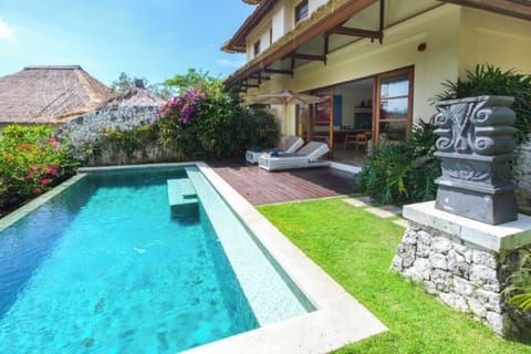Private pool and the pool deck at the entrance of the villa