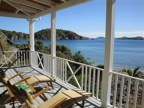 The Gallery Has a Hammock, Bistro Table and Chairs, teak lounge chairs