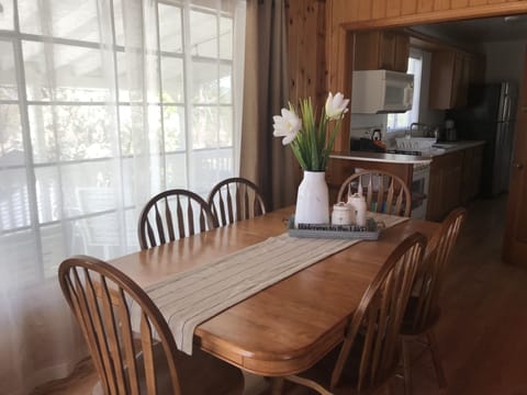 Kitchen dining table in main house (expands to seat 8)