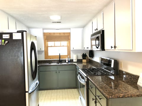Updated granite counter tops and appliances. Fully stocked kitchen! 