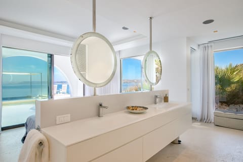 Double sinks in Master bedroom One in front of the pool and the sea.