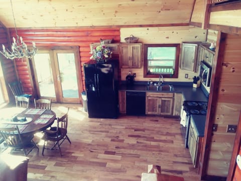 looking down at kitchen from stair case