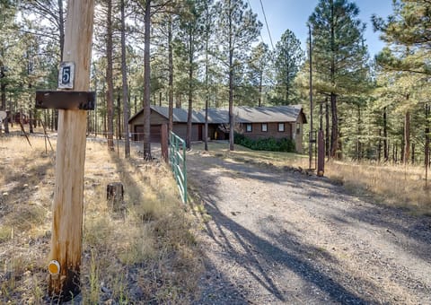 Cozy pine cabin retreat with peaceful views, private drive, and relaxing vibes—perfect for a quiet nature escape. Please park behind the gate.