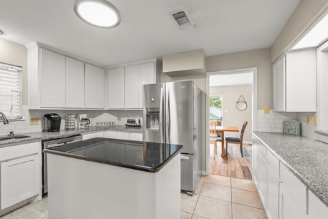 Your fully equipped kitchen with granite countertops.