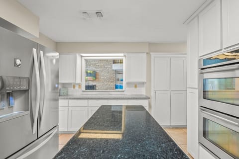 Your fully equipped kitchen with granite countertops.