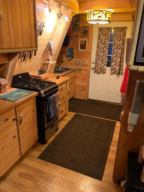 Kitchen with 2020 Commercial Gas Range Porcelain with sealed burners.