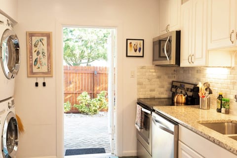 Kitchen - Opens Into the Private Back Patio.