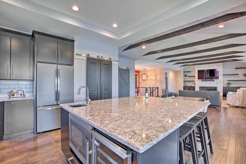 State-of-the-art appliances highlight the full kitchen.