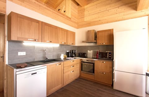 The fully-equipped kitchen features all the amenities you'd need to make a delicious meal.