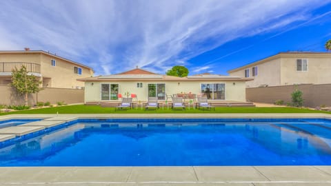 - Dive into relaxation by the sparkling private pool with sunny seating for lounging   - Perfect outdoor space for swimming, sunbathing, and hosting backyard gatherings   - Refreshing retreat just steps from the spacious home and inviting lounge chairs