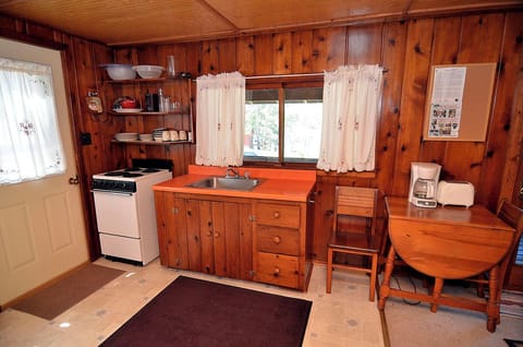 Kitchen/living room open concept.  Standard refrigerator.  Apt stove/oven.
