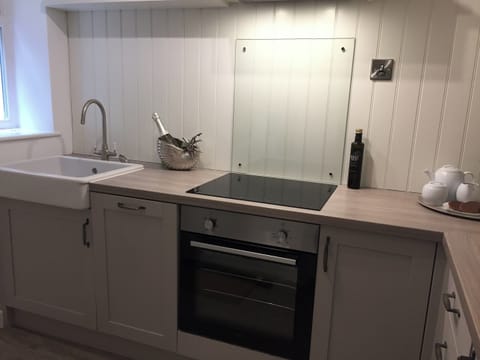 Modern galley style kitchen | Rockpool Cottage, Staithes near Whitby