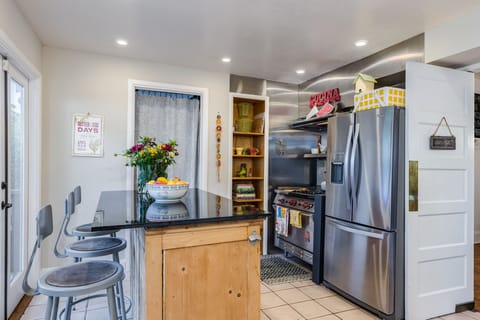 Granite top breakfast counter that sits 3.