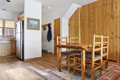 Dining table - The murphy bed is located in the cedar built in located in the dining room shown in this image.