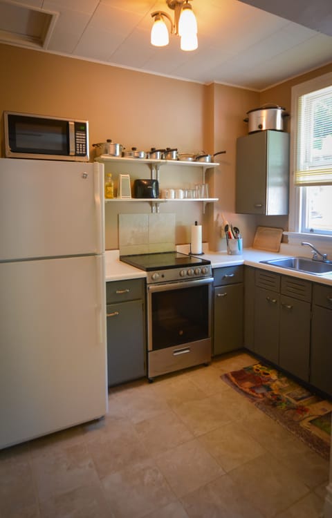 fully equipped kitchen included with spices, crockpot, stove, microwave and oven