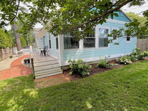 Side of house on Chicago St.  Driveway entrance for 4 car parking on Bayard