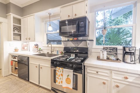 Full working Kitchen.  Gas stove, microwave, regular & Keurig coffee pots.