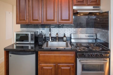 kitchenette area with everything you will need! pots pans, dishes seasonings,
