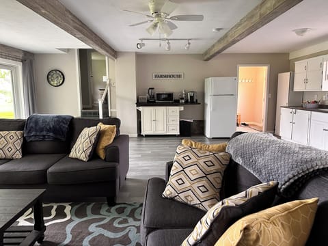 View from living room. Outside door on right, stairs on left to bedroom & bath.