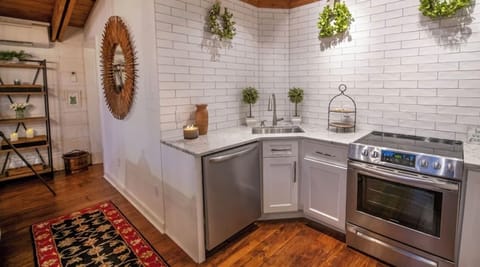 Located off of the screened porch you will find the kitchen and living area.