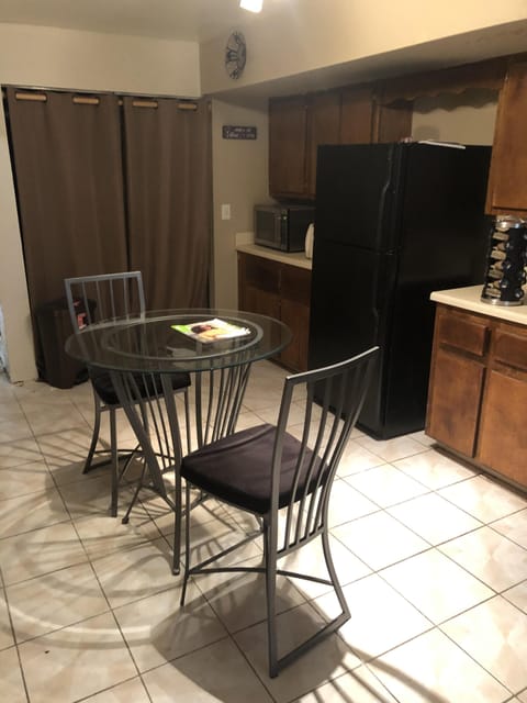 Kitchen has appliances overloaded - microwave, waffle, coffee maker, blender etc