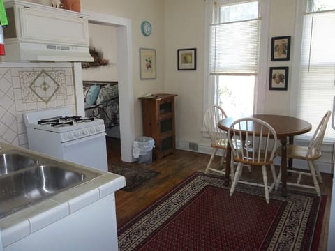 Every apartment has a kitchen w stove, refrigerator, microwave, Keurig & pots.