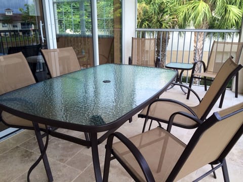 Screened in lanai with patio furniture