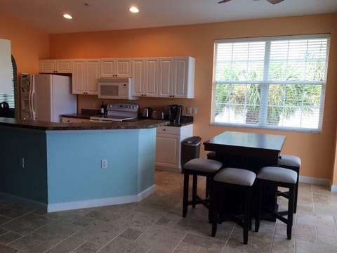 Open concept kitchen with eating area