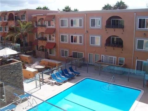 swimming pools with lounge chairs, spa, sauna, BBQ, exercise room, washer, dryer