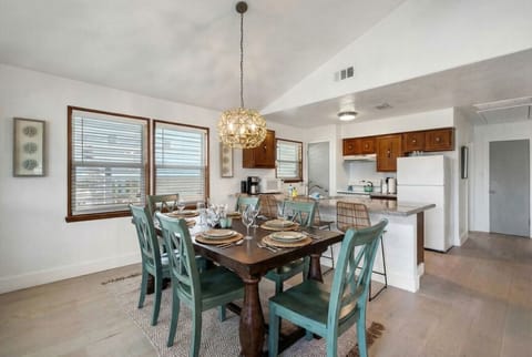 This dining area is located next to the kitchen