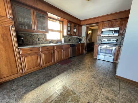 Main Level Kitchen, fully equipped with dishes, pots, silverware, & more!