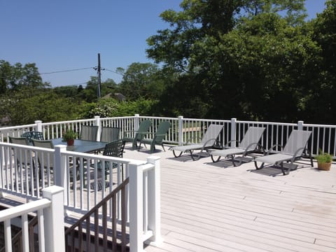 Large Deck with dinning table and umbrella