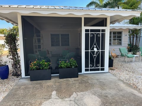 Brand New Florida Room welcomes you to Flamingo Cottage; Fine Mesh screening