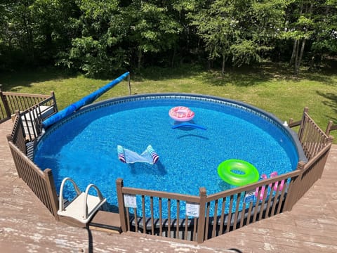 24' above ground heated pool, open from Memorial Day to Labor Day